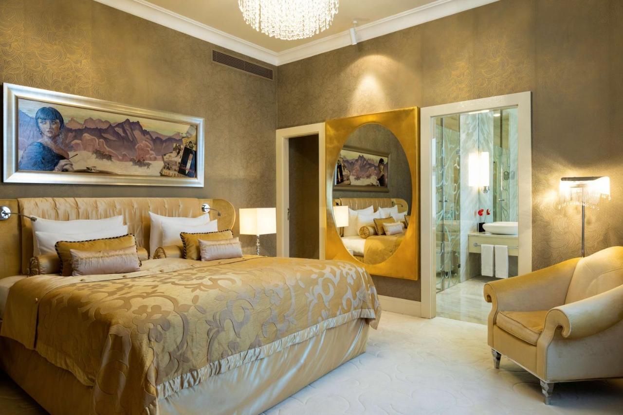 Grand Hotel Kempinski High Tatras Strbske Pleso Exterior photo A bedroom at the hotel